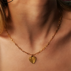 Mini Paper Clip Chain Anchoring a Patterned Heart Charm in Gold