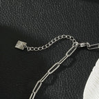 HEART WHITE Silver (White Gold): Paper Clip Chain Anchoring an Enameled White Heart Charm
