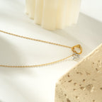 Two Abstract Heart Charms in Gold & Silver