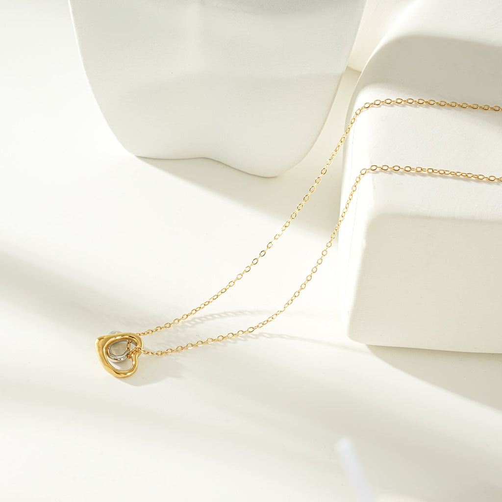 Two Abstract Heart Charms in Gold & Silver