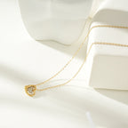 Two Abstract Heart Charms in Gold & Silver