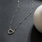 CHERISH Silver (White Gold): Beaded Chain Anchoring an Elegant Pavé Heart Charm Pendant