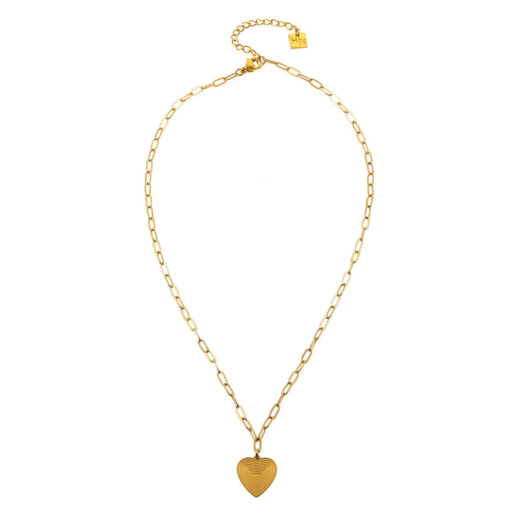 Mini Paper Clip Chain Anchoring a Patterned Heart Charm in Gold